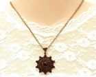 Vintage garnet star LOCKET