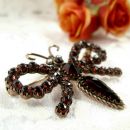 Vintage garnet butterfly brooch in Victorian style