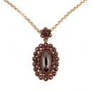 Vintage oval garnet locket/pendant in Victorian style