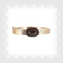 Vintage hinged garnet bangle in Victorian style