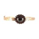 # Vintage garnet bangle with an oval center stone