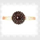 Vintage hinged garnet bangle in Victorian style